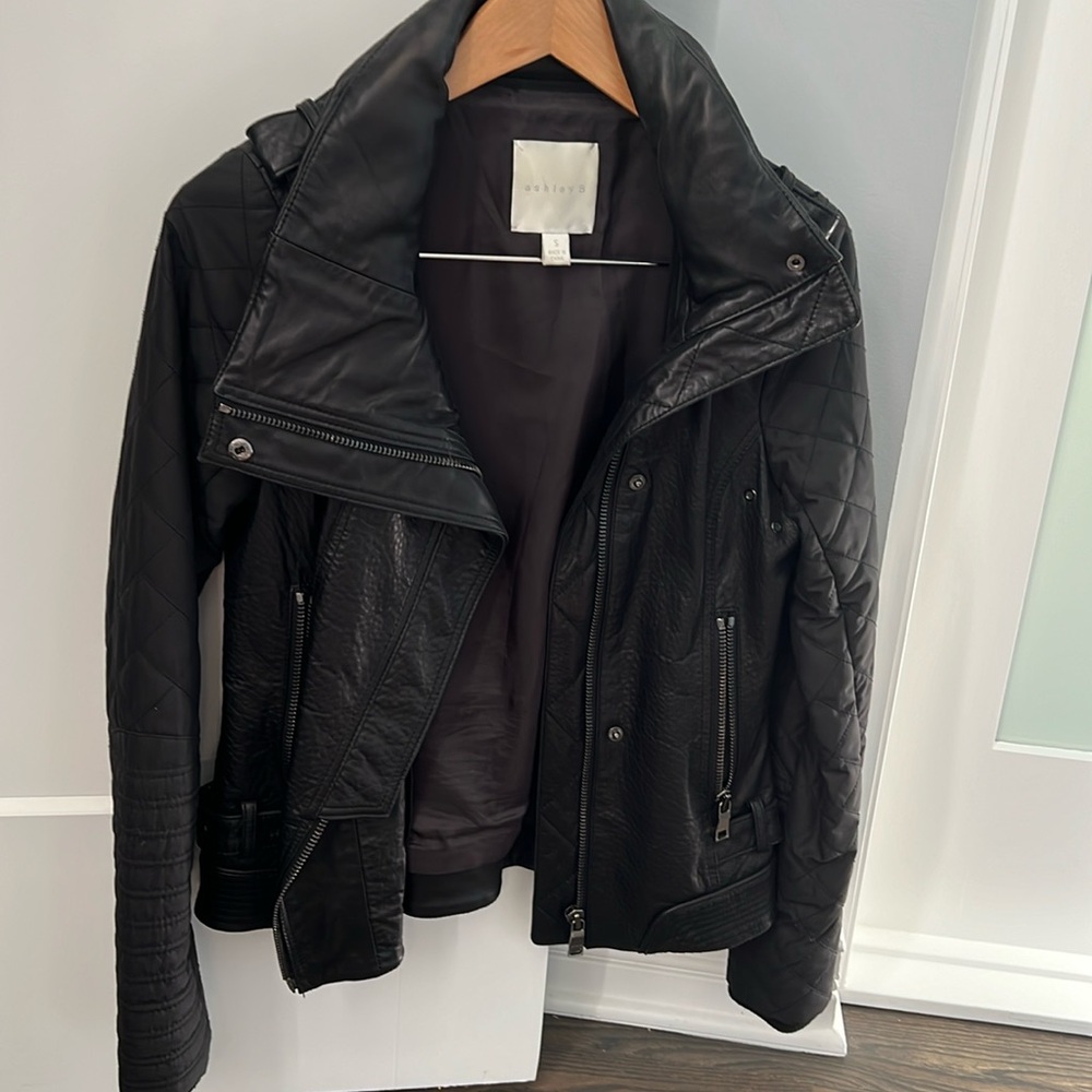 Excellent condition with hood, leather jacket with nylon/polyester sleeves.